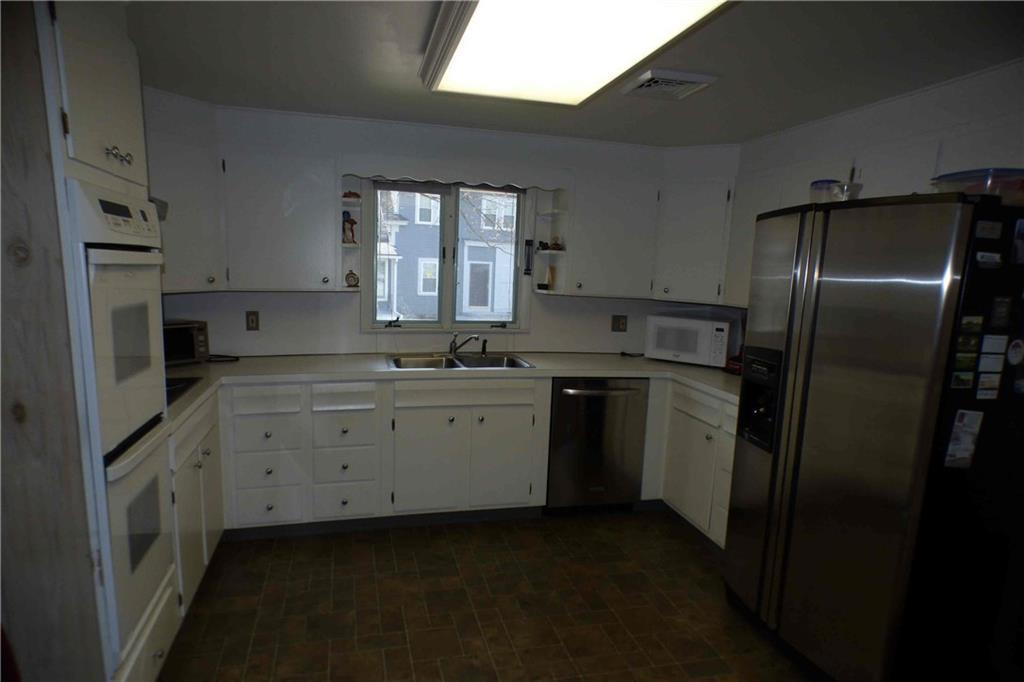 3 Simpson Lane York, ME 03909 - Photo 7 of 13 The white kitchen offers good...
