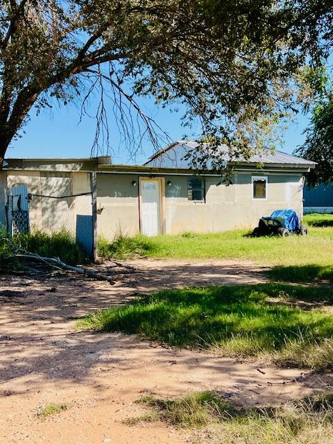 6318 East County Road 6500 Lubbock, TX 79403 - Photo 17 of 17 a view of a house with a yard