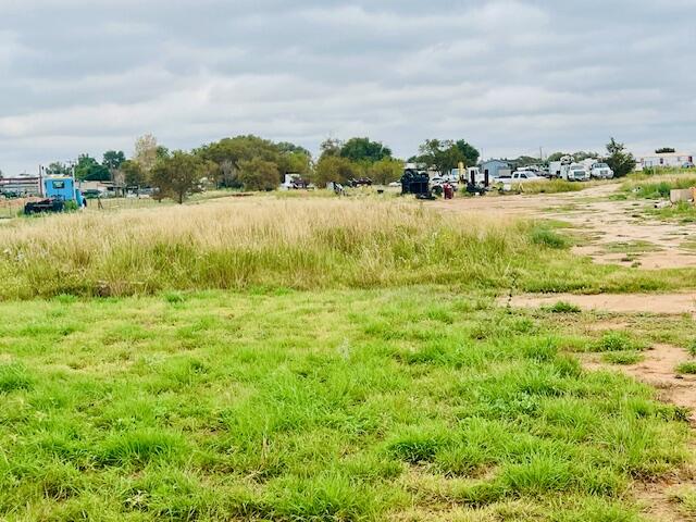 6318 East County Road 6500 Lubbock, TX 79403 - Photo 4 of 17 a view of a lake with houses in the back