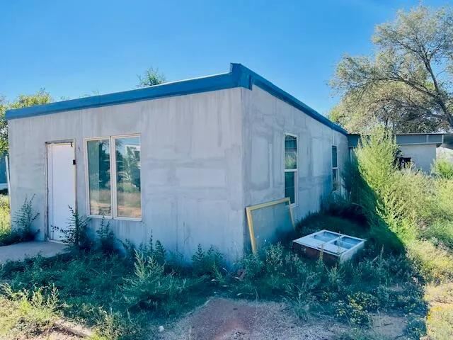 a view of a back yard of the house