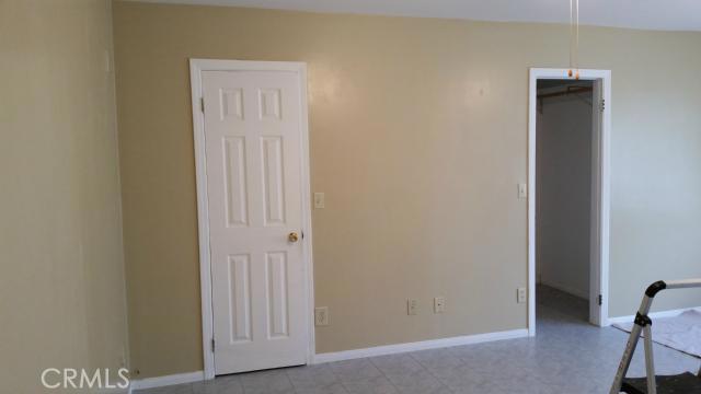 62323 Mars Drive Joshua Tree, CA 92252 - Photo 15 of 26 a view of a livingroom and an empty room
