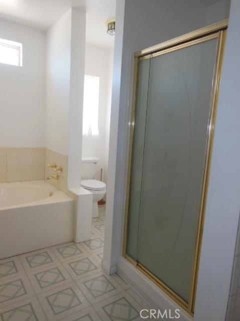 62323 Mars Drive Joshua Tree, CA 92252 - Photo 22 of 26 a bathroom with a bathtub and a shower