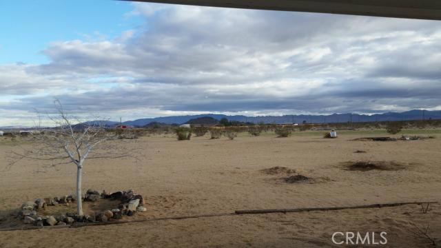 62323 Mars Drive Joshua Tree, CA 92252 - Photo 26 of 26 a view of a lake and a mountain