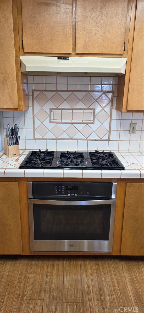 62323 Mars Drive Joshua Tree, CA 92252 - Photo 3 of 26 a close view of stove top oven