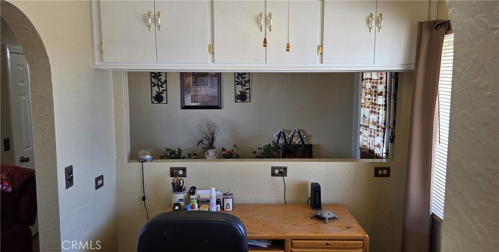 62323 Mars Drive Joshua Tree, CA 92252 - Photo 8 of 26 a room with cabinets and wooden floor