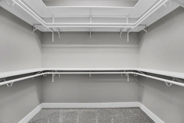 a view of an empty walk in closet