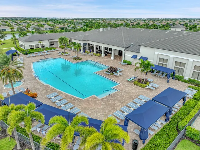 an aerial view of a house with outdoor space