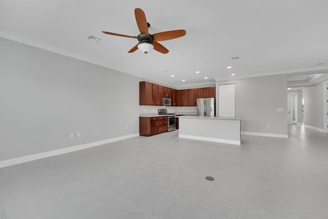 a view of a kitchen with a sink and cabinet