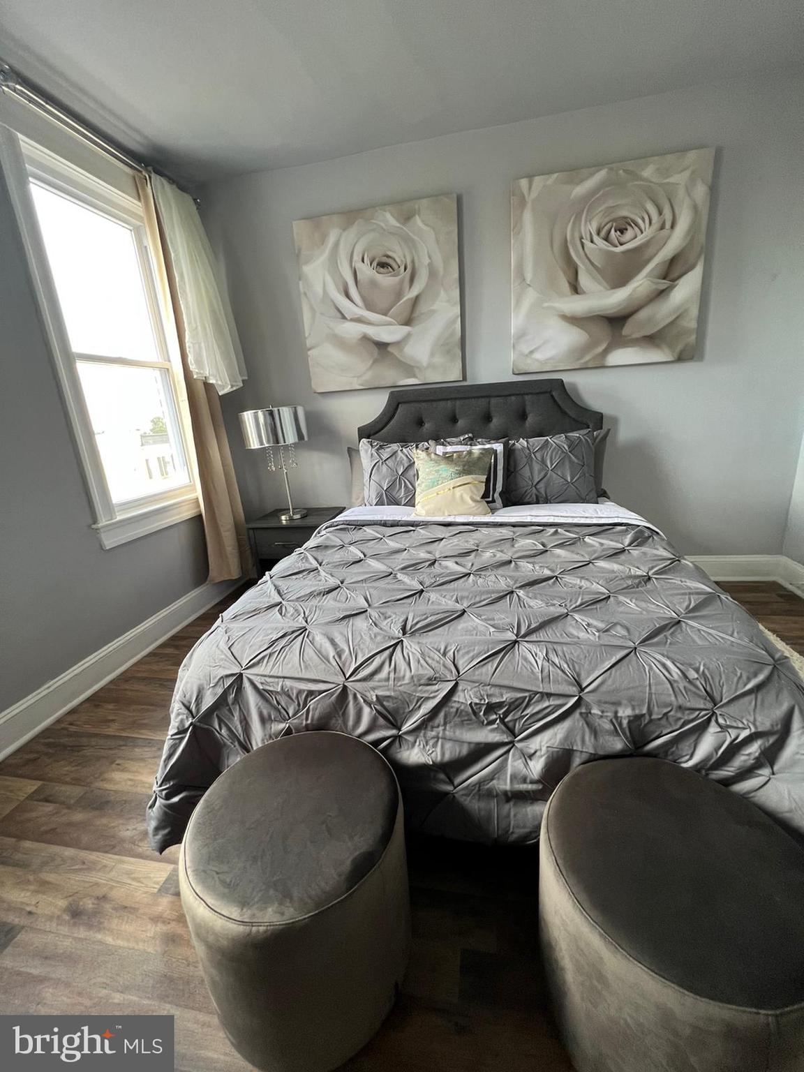 622 Allendale Street Baltimore, MD 21229 - Photo 11 of 29 a bedroom with a bed and window