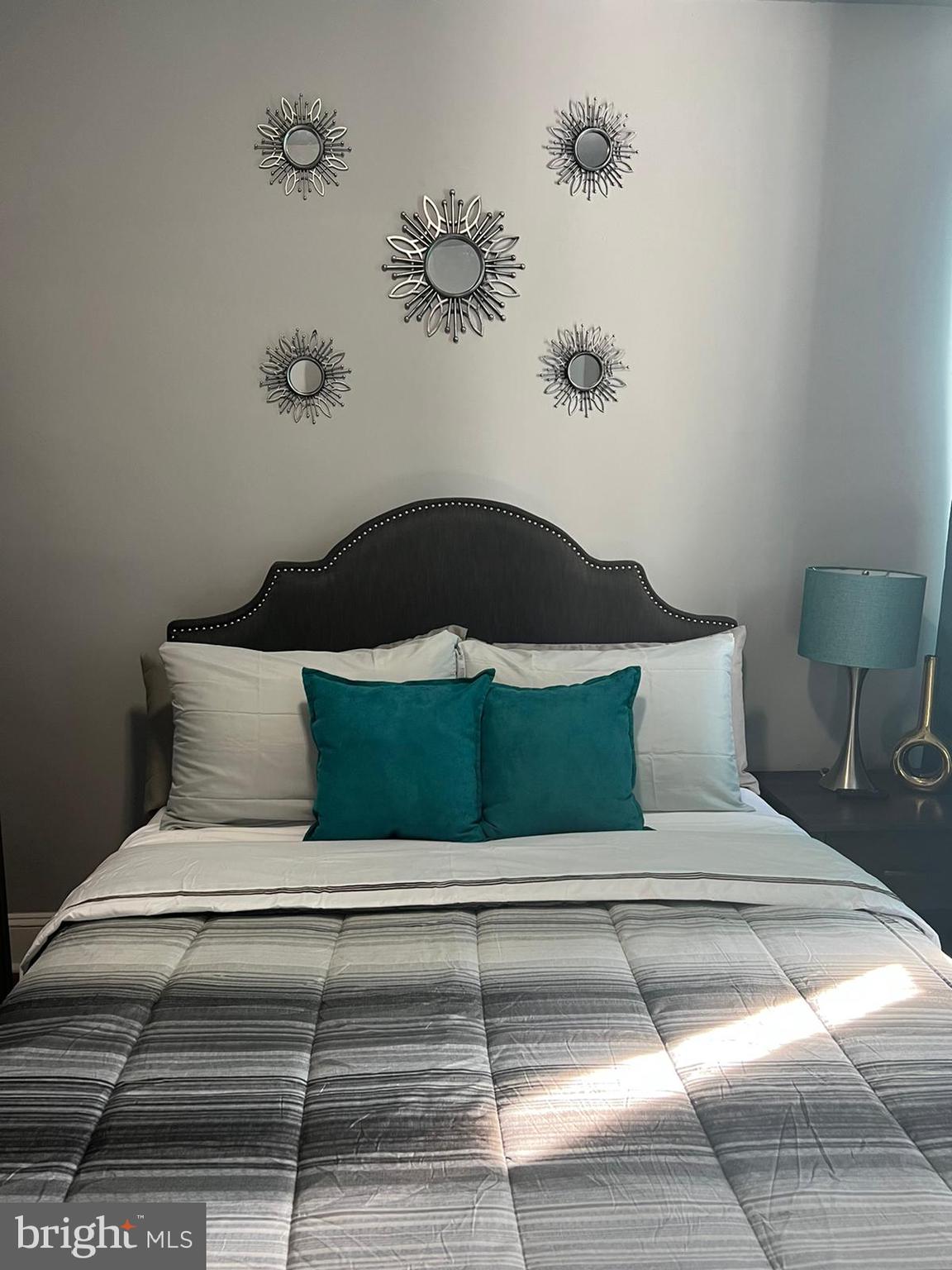 622 Allendale Street Baltimore, MD 21229 - Photo 16 of 29 a bedroom with a bed and window