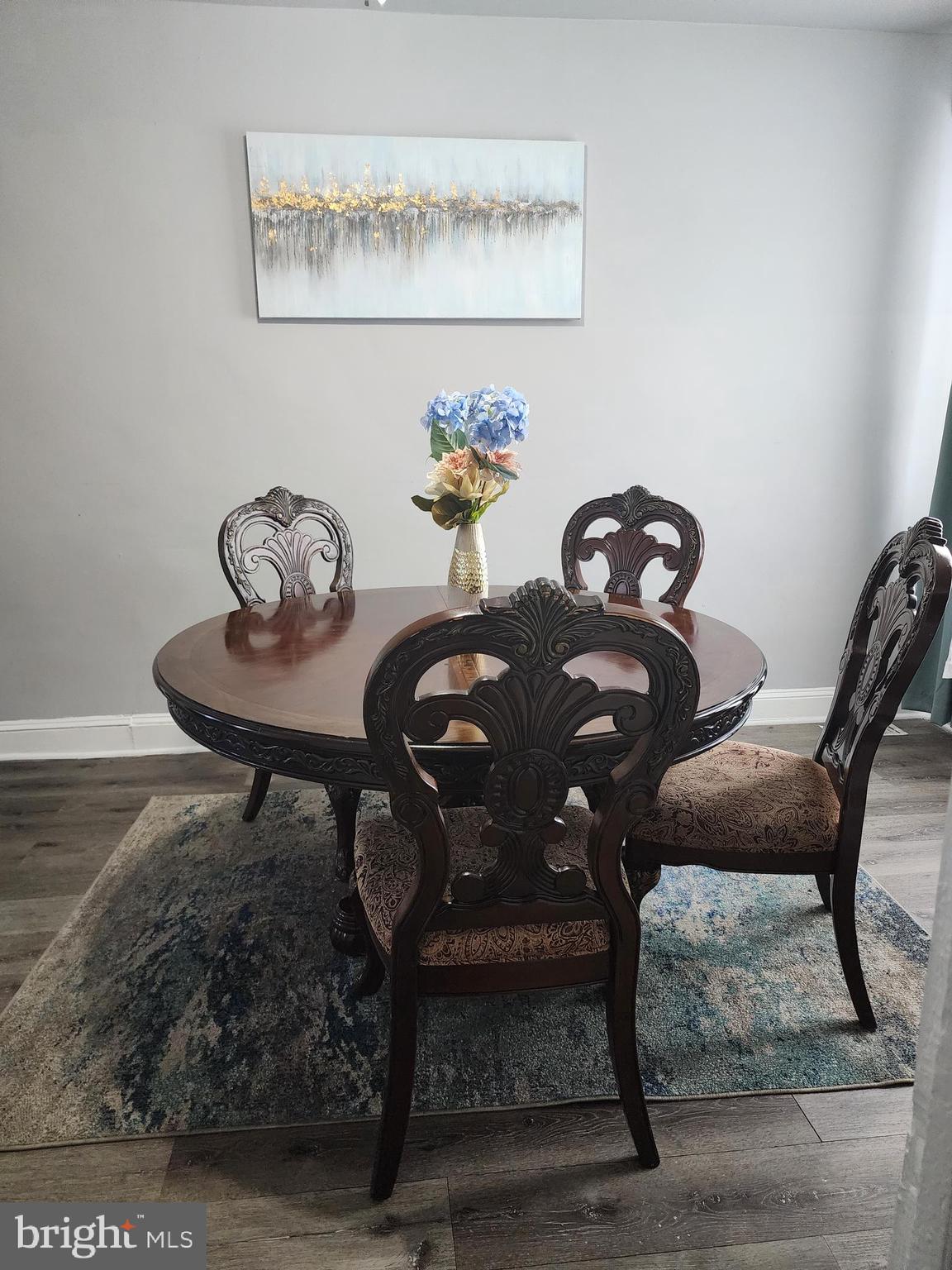 622 Allendale Street Baltimore, MD 21229 - Photo 5 of 29 a dining room with furniture and wooden floor