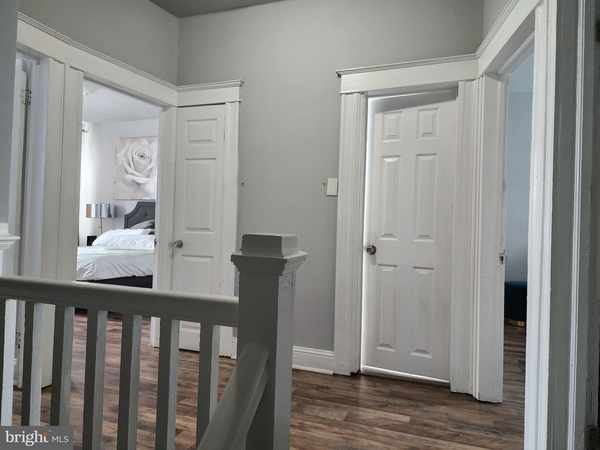 622 Allendale Street Baltimore, MD 21229 - Photo 8 of 29 a view of a bedroom from a hallway