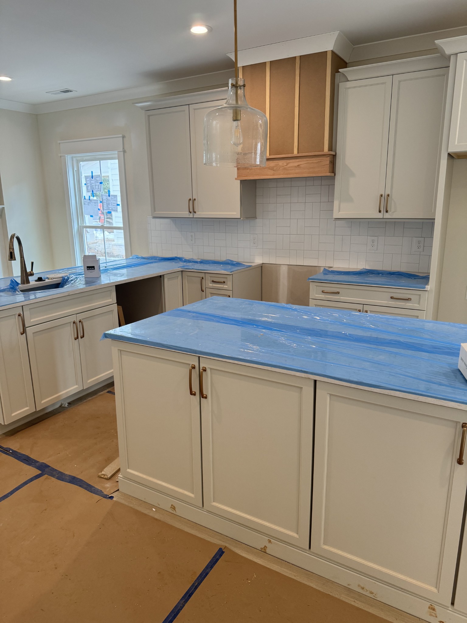 919 Haynes Drive Murfreesboro, TN 37129 - Photo 3 of 18 a kitchen with stainless steel appliances granite countertop a sink a stove and white cabinets