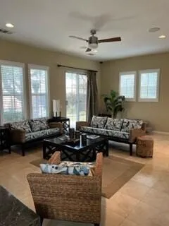 a living room with furniture and a couch
