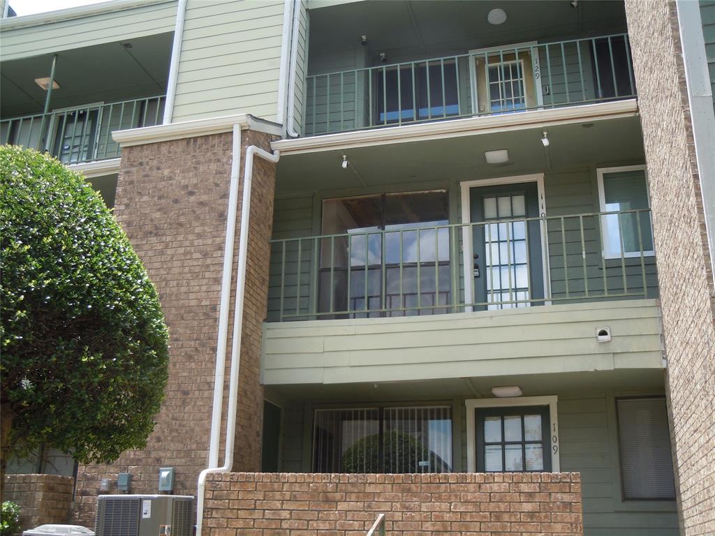 a view of a building with a window and balcony