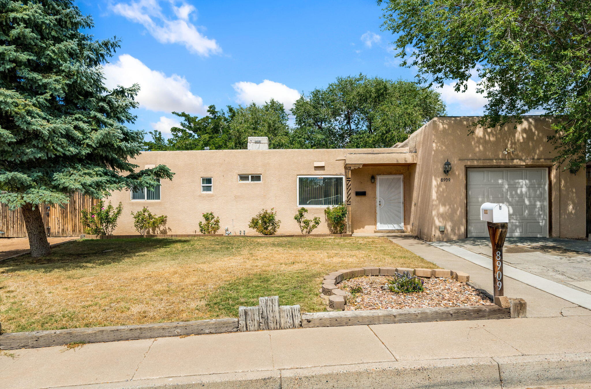 8909 Shoshone Road Northeast Albuquerque, NM 87111 - Photo 1 of 35 Gallery Image 1