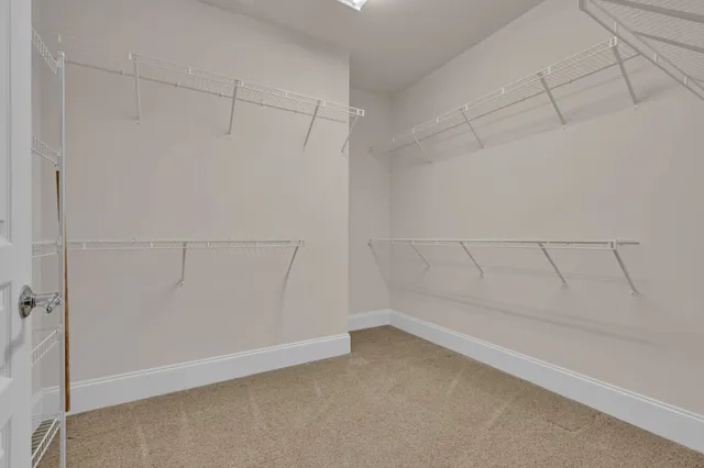 a view of an empty walk in closet