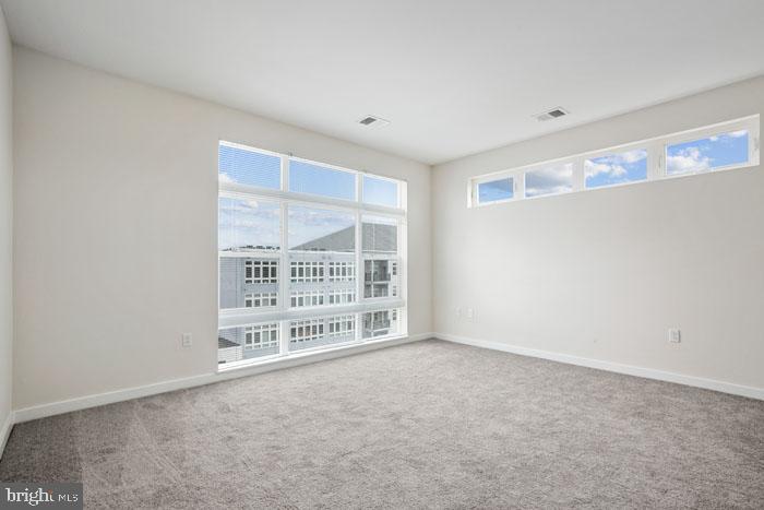 131 Bridge Street, Unit 2B22416 Phoenixville, PA 19460 - Photo 76 of 104 a view of an empty room with a window