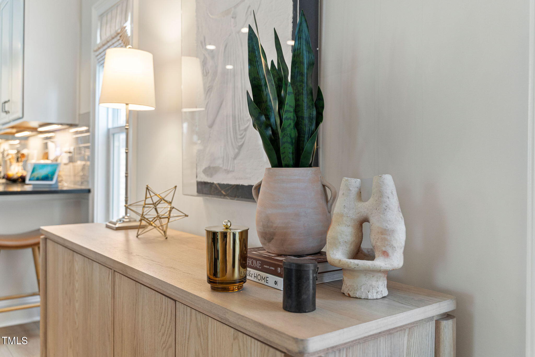 1344 Brown Velvet Lane Apex, NC 27523 - Photo 17 of 63 a living room with furniture a mirror and lamp