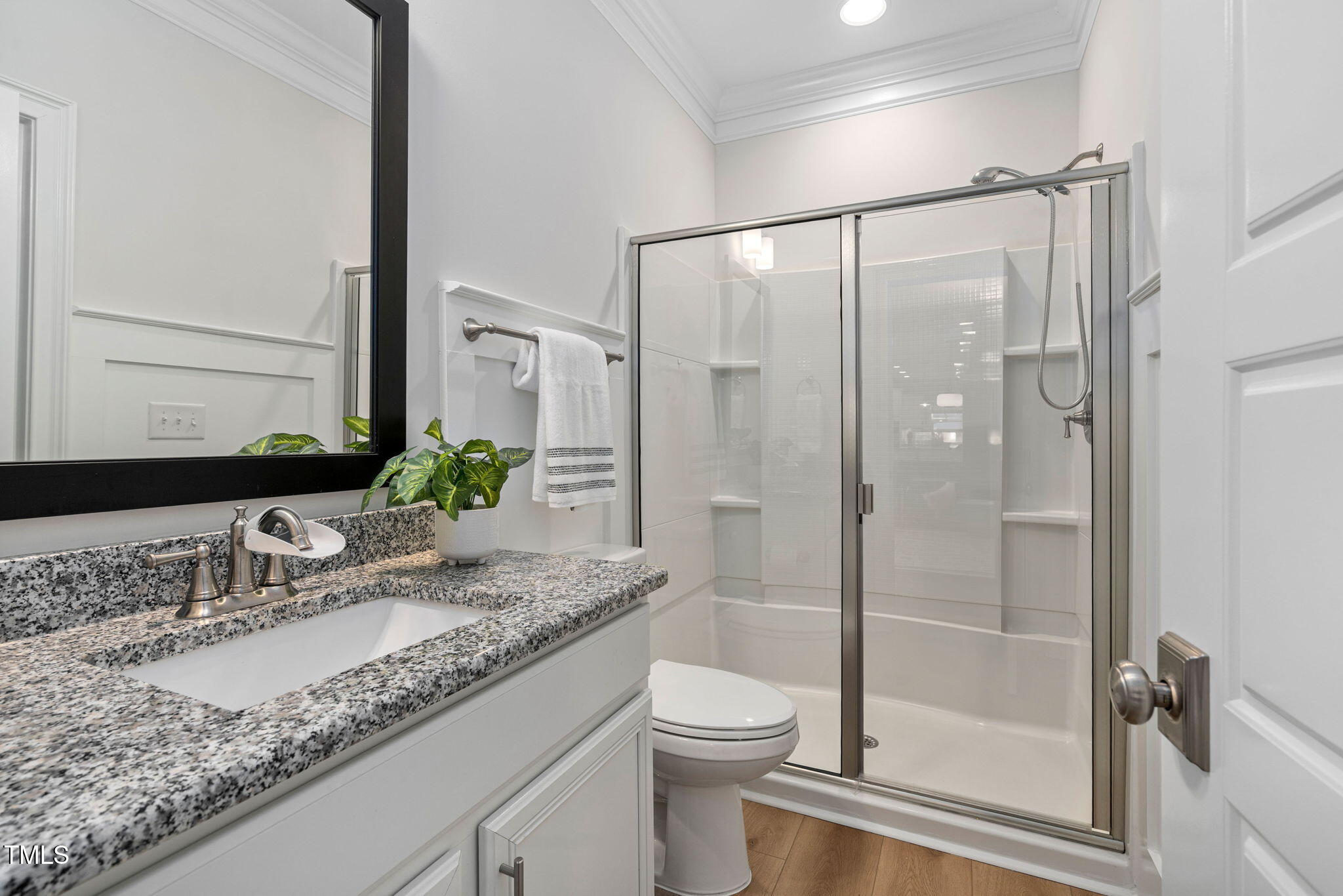 1344 Brown Velvet Lane Apex, NC 27523 - Photo 27 of 63 a bathroom with a granite countertop sink toilet and shower