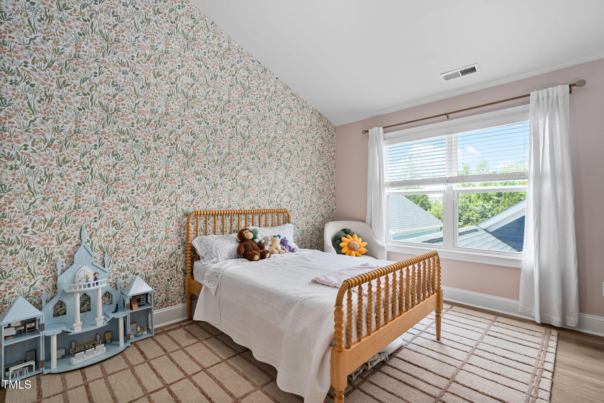 1344 Brown Velvet Lane Apex, NC 27523 - Photo 32 of 63 a bedroom with a bed and a window