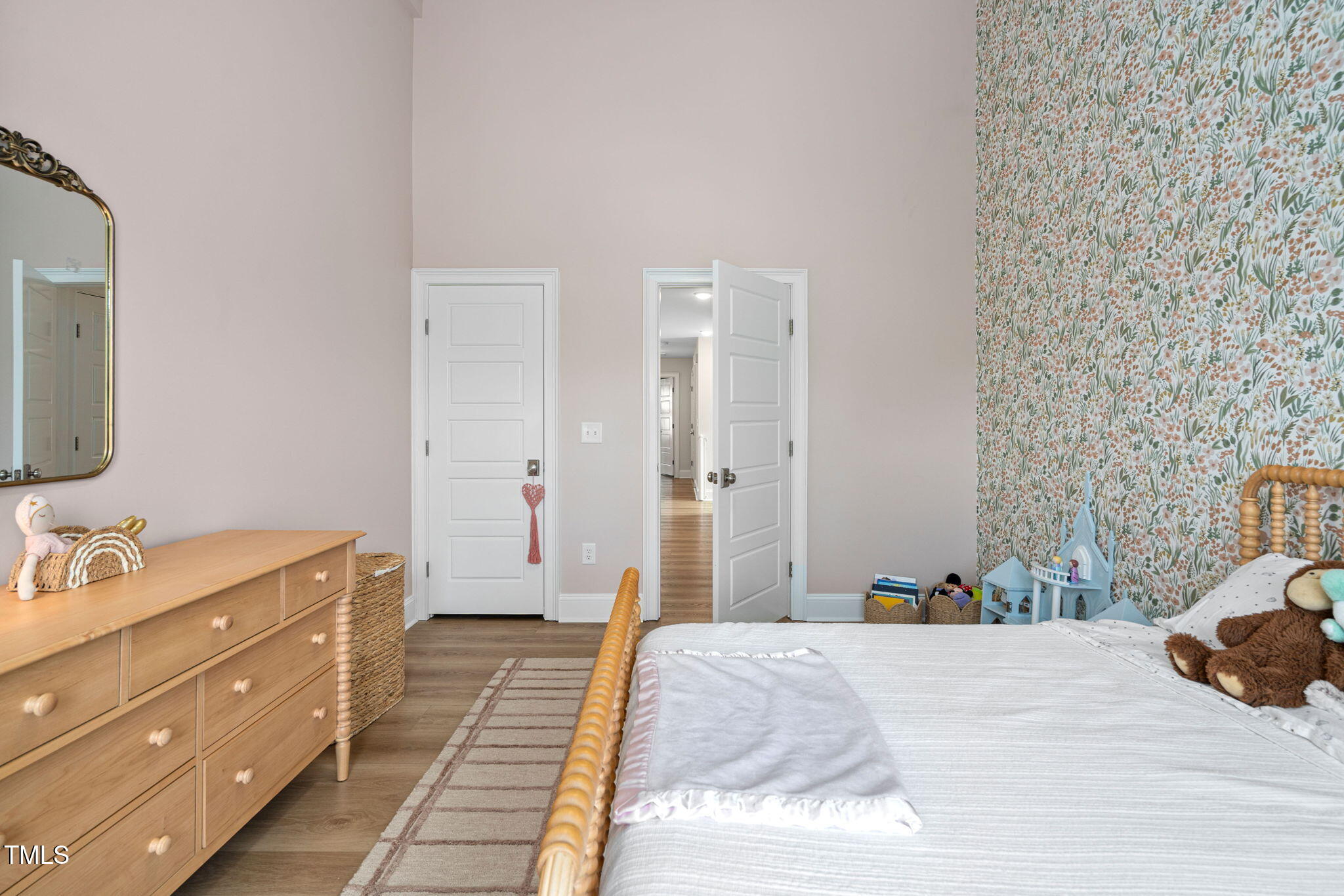 1344 Brown Velvet Lane Apex, NC 27523 - Photo 33 of 63 a bedroom with a bed and a dresser