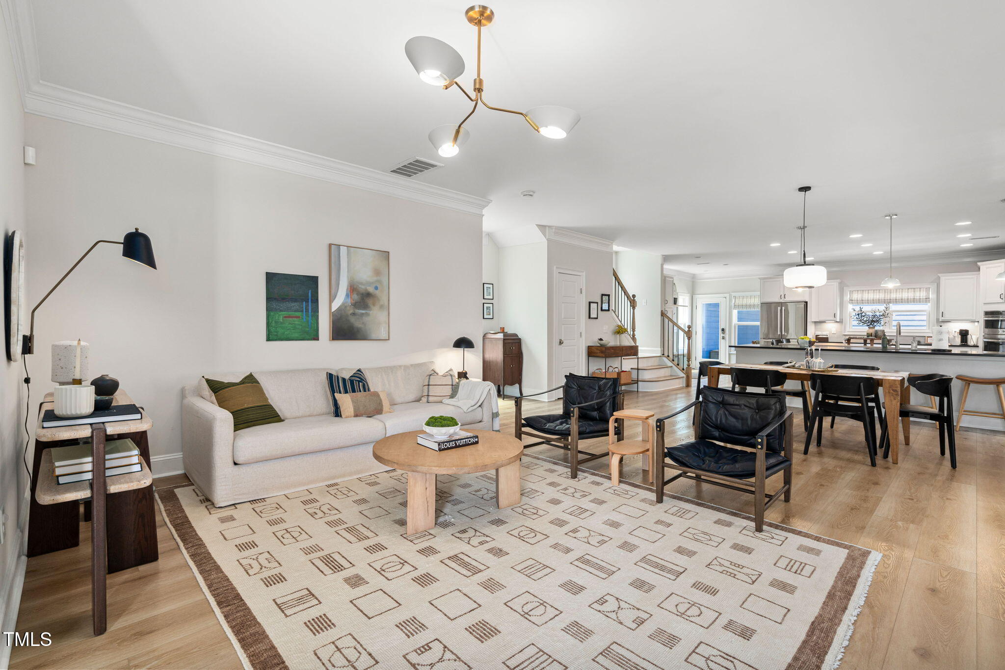 1344 Brown Velvet Lane Apex, NC 27523 - Photo 35 of 63 a living room with furniture and wooden floor