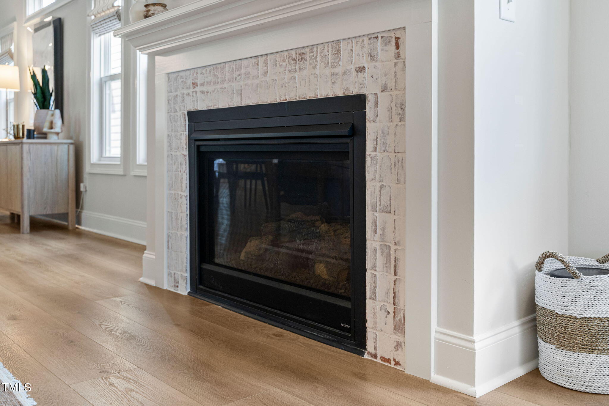 1344 Brown Velvet Lane Apex, NC 27523 - Photo 38 of 63 a living room with a fireplace