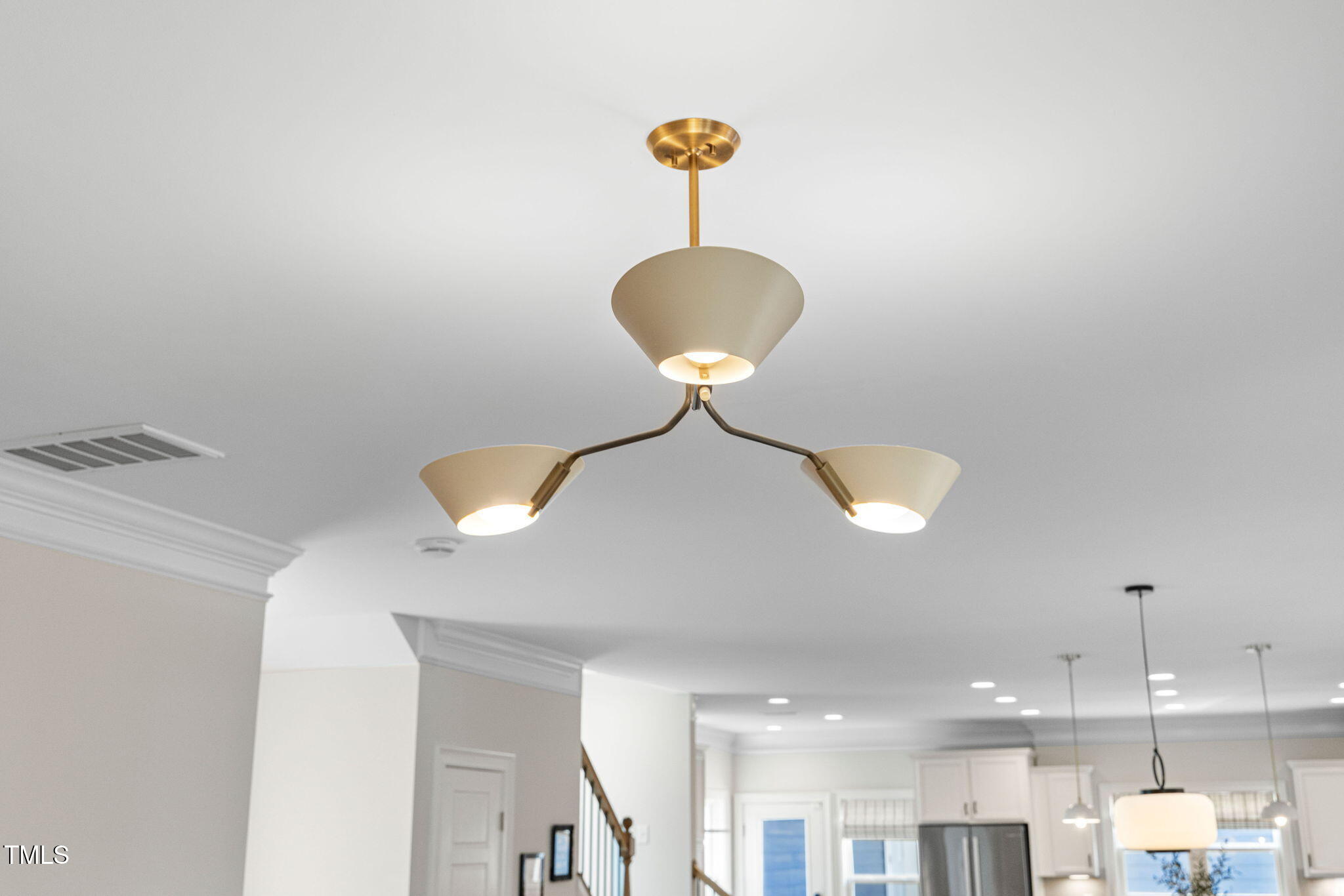 1344 Brown Velvet Lane Apex, NC 27523 - Photo 39 of 63 a view of a hallway with chandelier