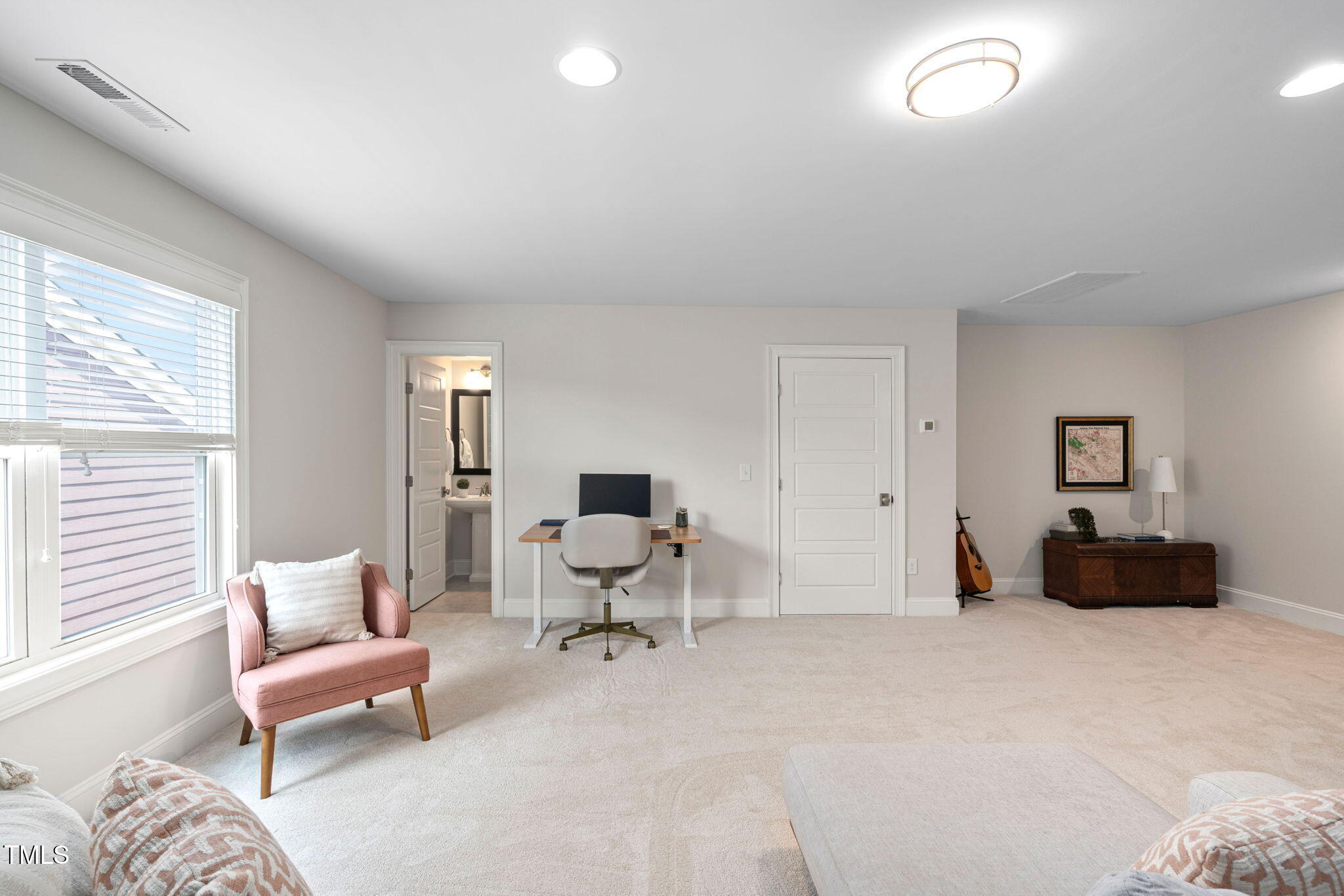 1344 Brown Velvet Lane Apex, NC 27523 - Photo 42 of 63 a living room with furniture and a potted plant