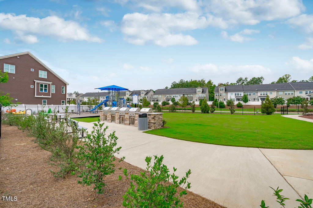 1344 Brown Velvet Lane Apex, NC 27523 - Photo 46 of 63 a view of a garden with houses