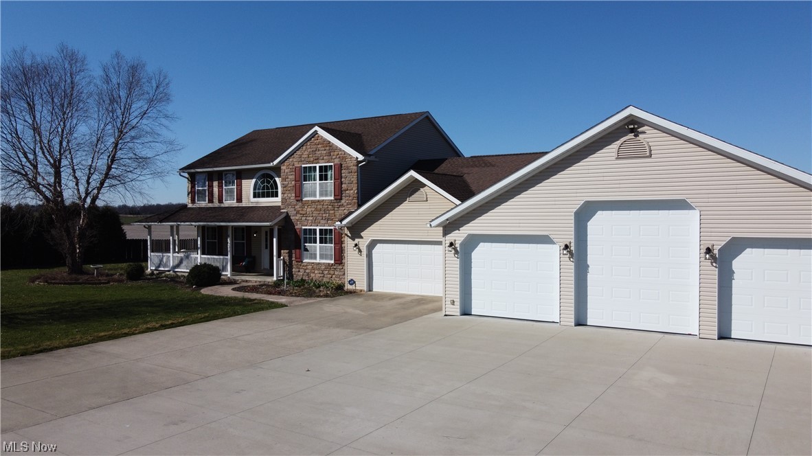 View of front of house featuring a front lawn