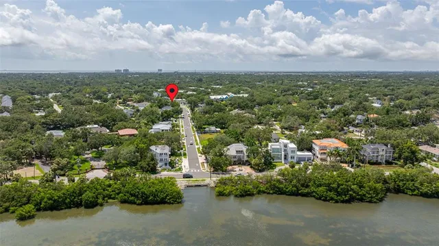 an aerial view of residential house and outdoor space