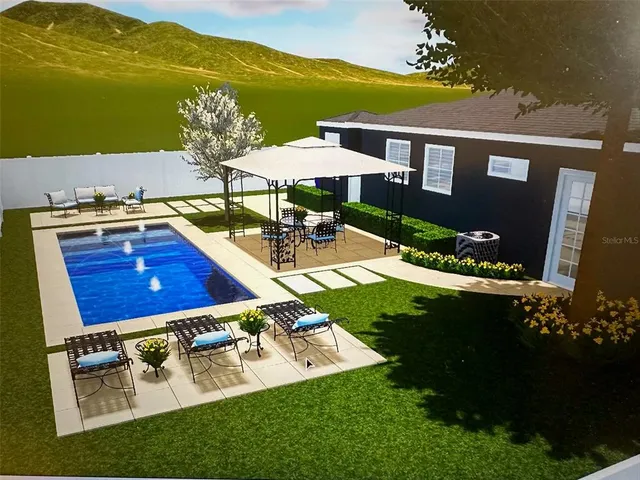 an aerial view of a house having yard