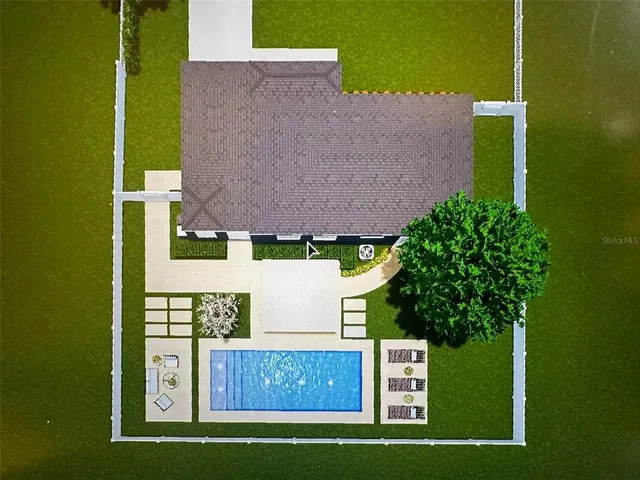 a view of swimming pool with outdoor seating and plants