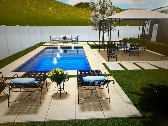 a view of a bench in backyard of a house