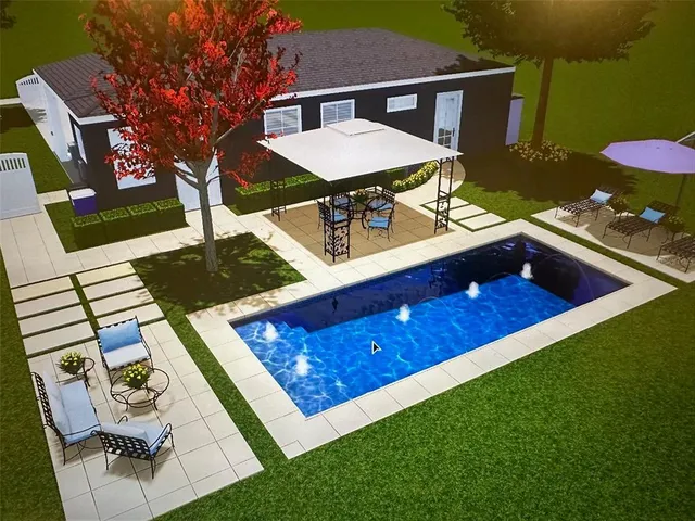 a view of sitting area in front of house