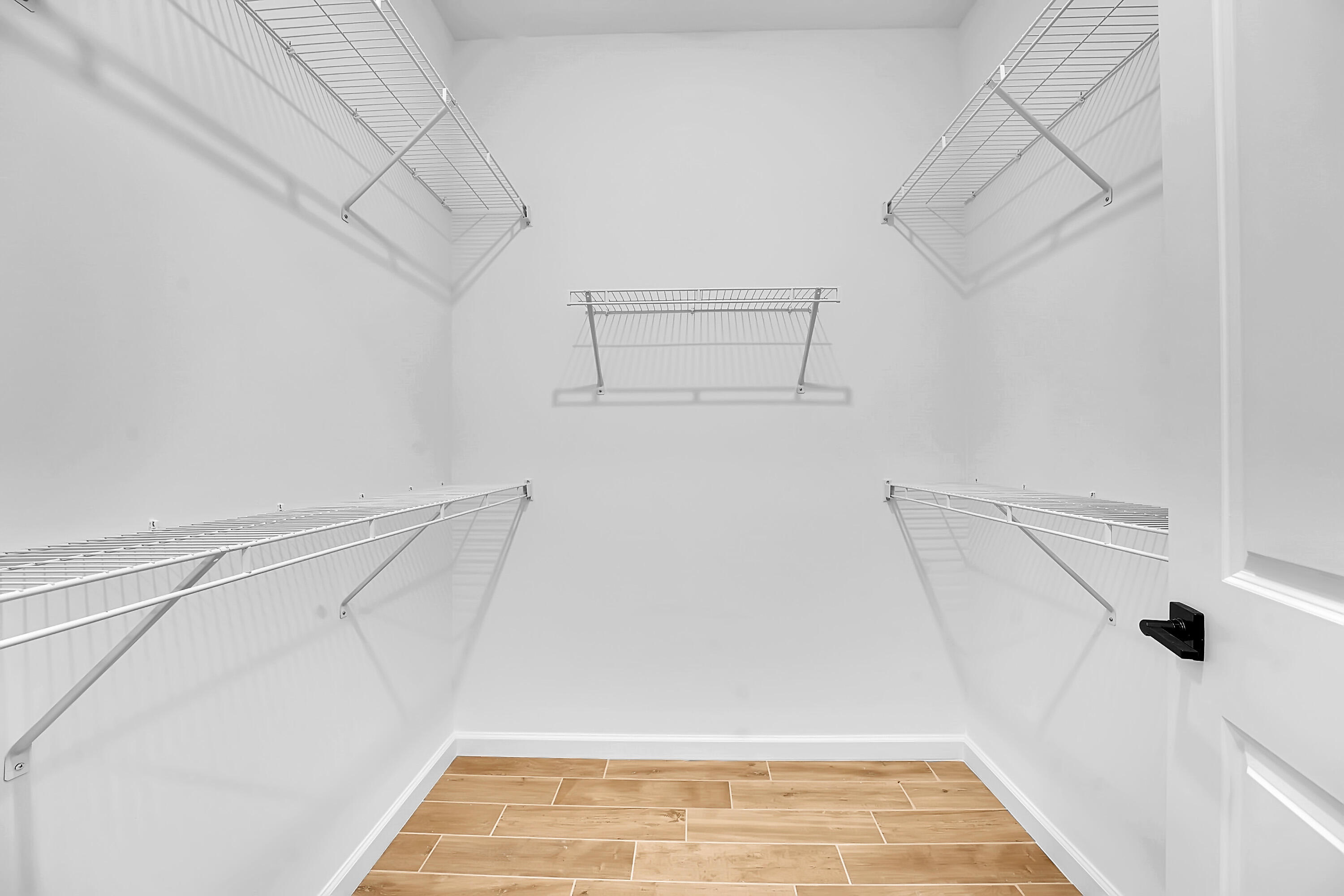 4572 Nautilus Circle Vero Beach, FL 32967 - Photo 13 of 33 a view of a room with racks on the wall