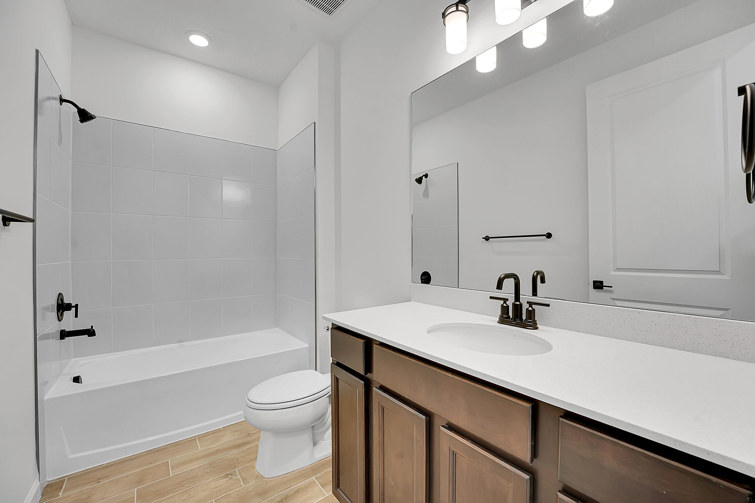 4572 Nautilus Circle Vero Beach, FL 32967 - Photo 16 of 33 a bathroom with a sink a toilet and shower