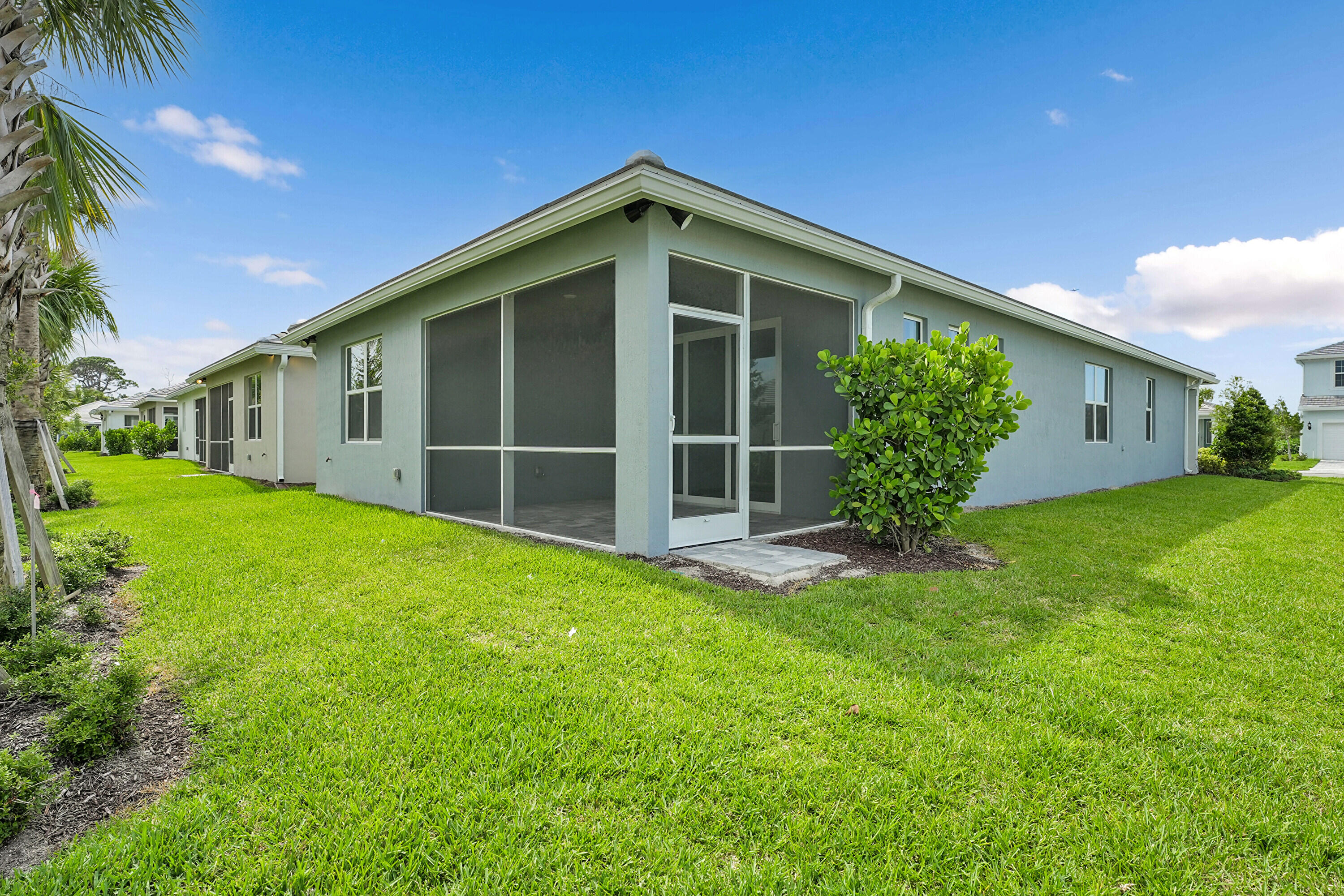 4572 Nautilus Circle Vero Beach, FL 32967 - Photo 21 of 33 a view of an house with backyard space and garden