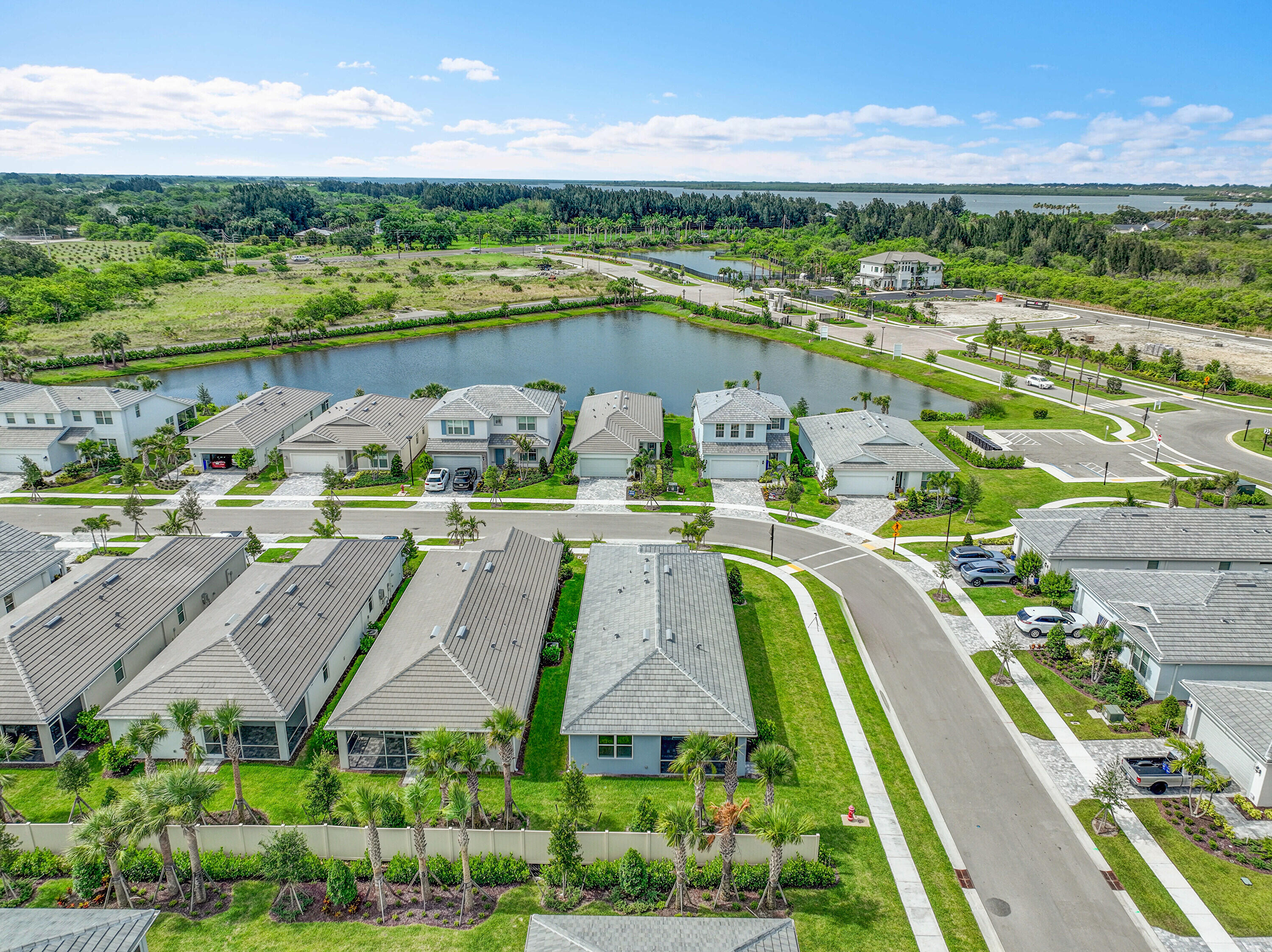 4572 Nautilus Circle Vero Beach, FL 32967 - Photo 26 of 33 an aerial view of a city with a lake view