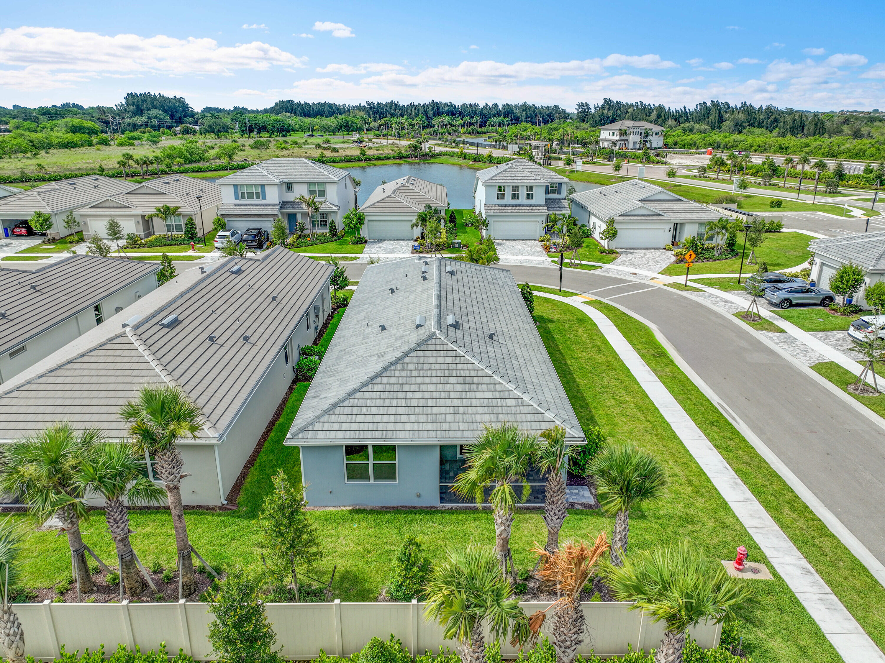 4572 Nautilus Circle Vero Beach, FL 32967 - Photo 29 of 33 an aerial view of a house with a garden and lake view