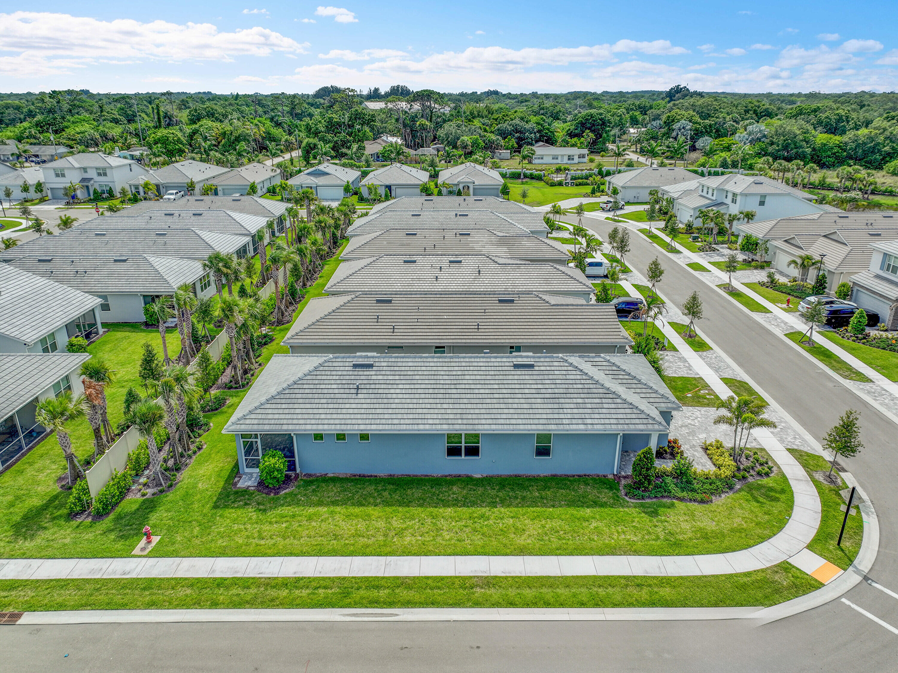 4572 Nautilus Circle Vero Beach, FL 32967 - Photo 31 of 33 a view of a garden with a swimming pool