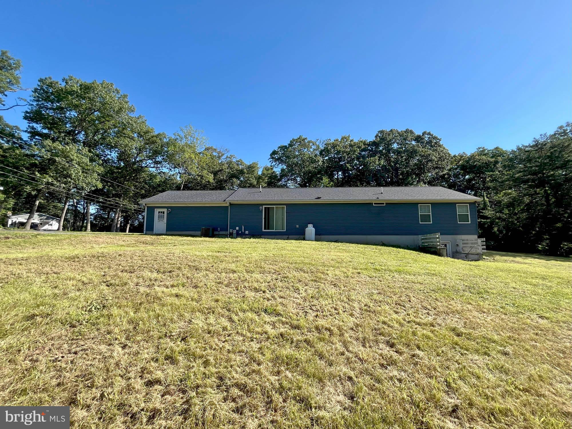 801 Lagrange Road Street, MD 21154 - Photo 3 of 33 a house view with a swimming pool