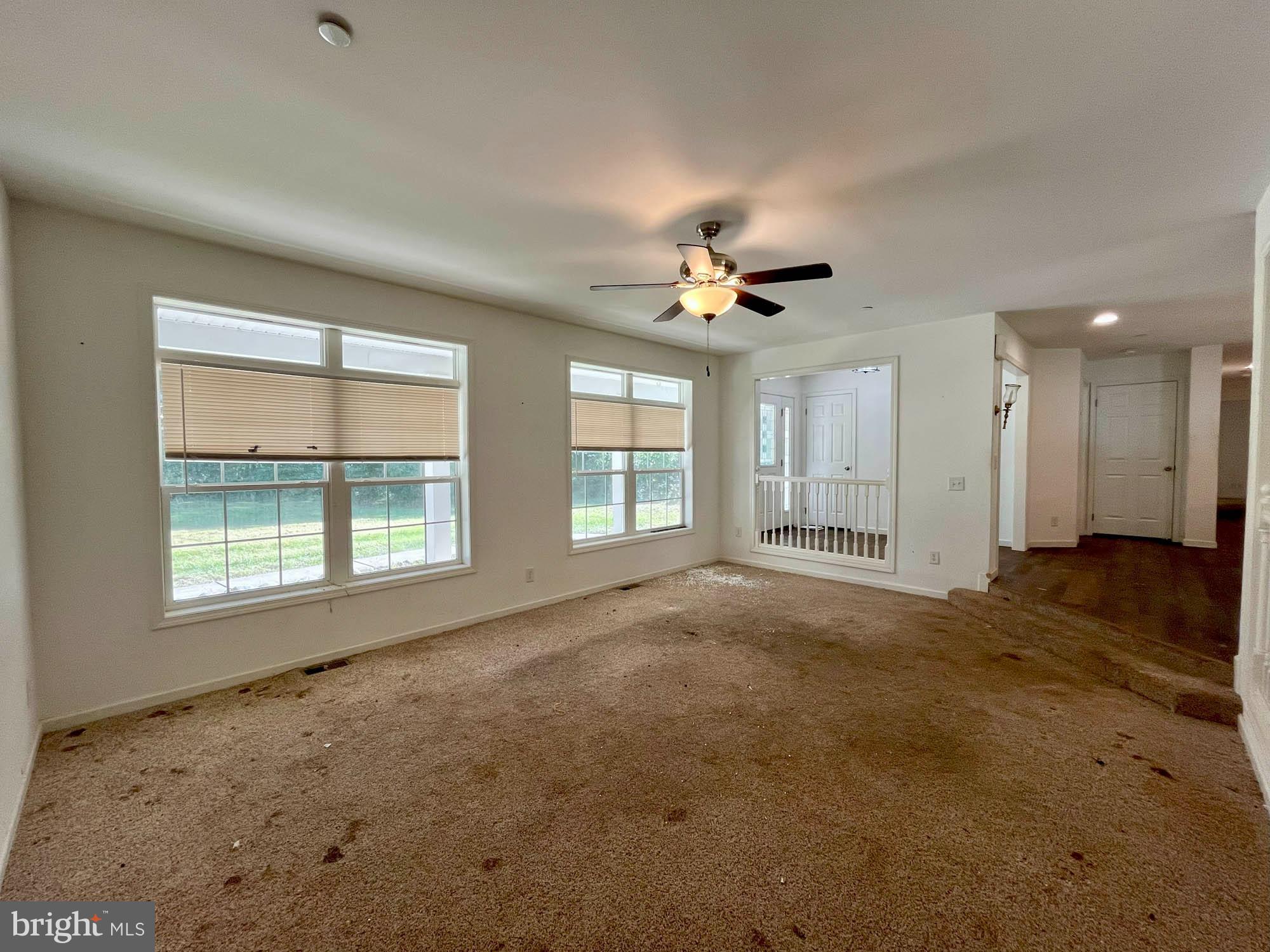 801 Lagrange Road Street, MD 21154 - Photo 10 of 33 a view of an empty room with a window