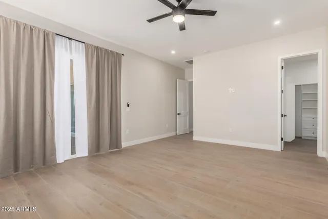 an empty room with windows