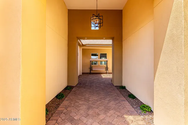 a view of an empty room with a fireplace