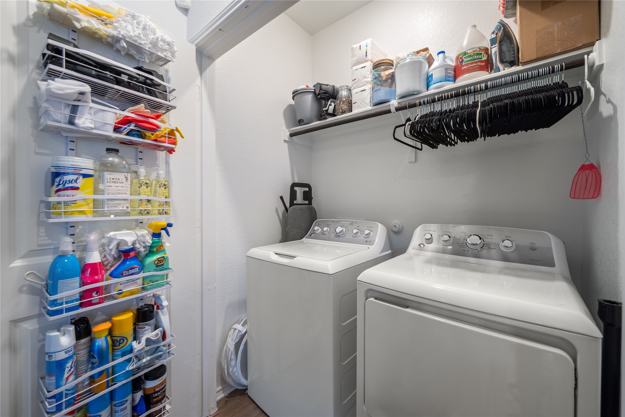 14404 Berning Road Manor, TX 78653 - Photo 25 of 38 A well-organized laundry area featuring convenient shelving and essential appliances.