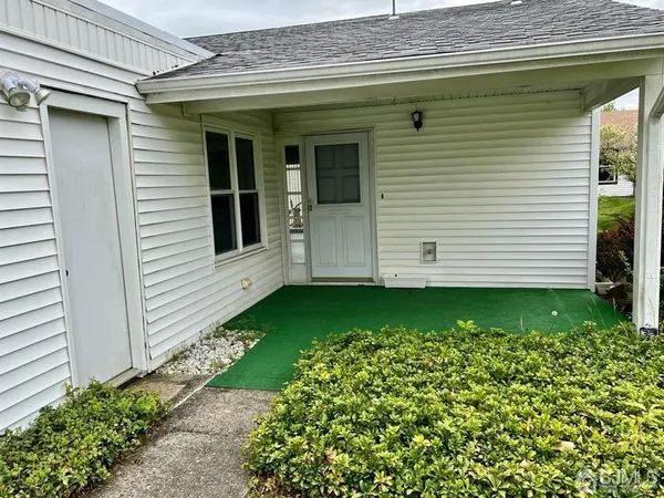 a view of a house with a garden
