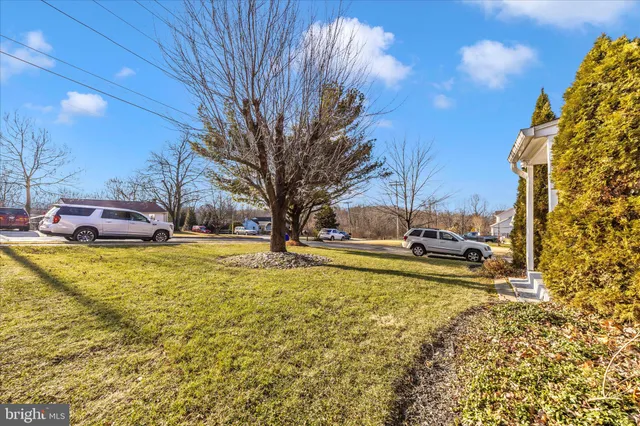 a kitchen with a dining table and chairs